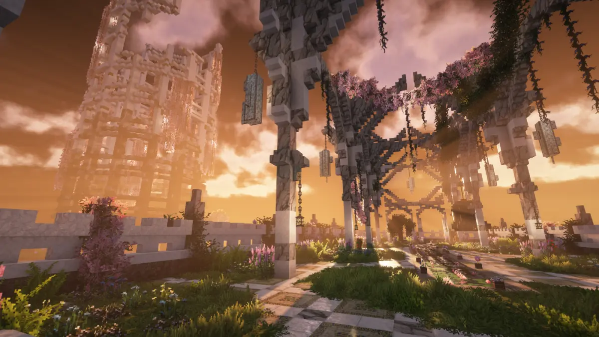Minecraft stone architecture surrounded by flowers and warm lighting.